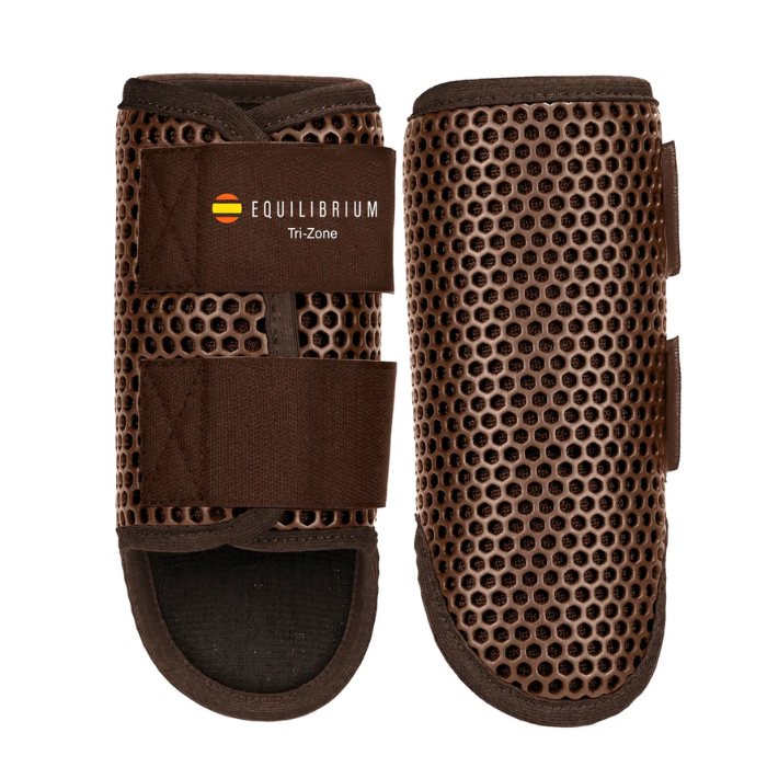 Pair of brown horse leg boots with Equilibrium branding on a white background