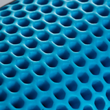 Close-up of blue foam with a honeycomb pattern