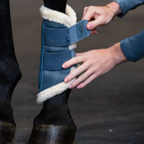 Eskadron Classic Sports Mesh Faux Fur Tendon Boots in Steel Blue being fastened