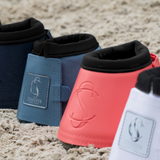 Selection of Eskadron Classic Sports Soft Slate Bell Boots on the sand surface of a menage