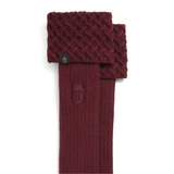 Maroon knitted sock with a brand logo on a white background