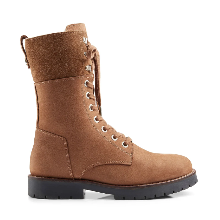 Brown suede boot with laces on a white background