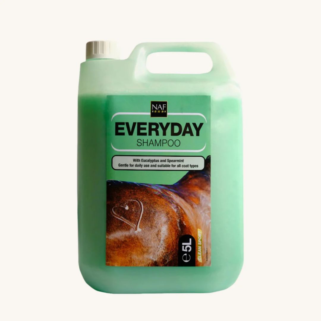Green bottle of NAF Everyday Shampoo with a horse's hind on the label against a white background