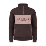 LeMieux AW26 Heritage Quarter Zip Sweat Varient Cocoa. A dark brown quarter-zip sweatshirt with a light pink chest panel featuring the black text 'LEMIEUX HERITAGE'.