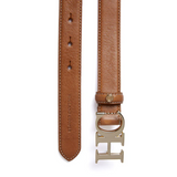 Brown leather belt with gold buckle on a white background