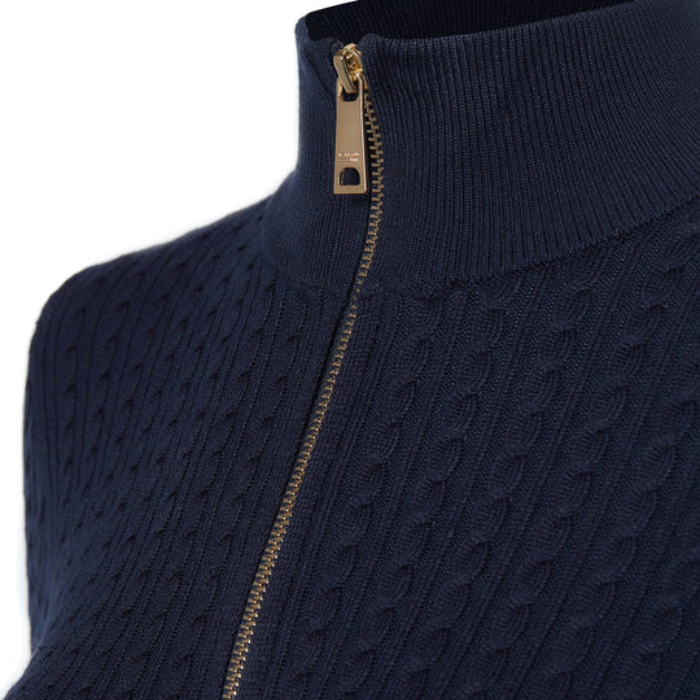 Navy blue cable knit jumper with a gold zipper on a white background