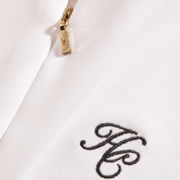 Embroidered HC detail on the Holland Cooper Burghley Short Sleeve Baselayer in White