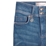 Close-up of a blue jean with gold hardware on a white background