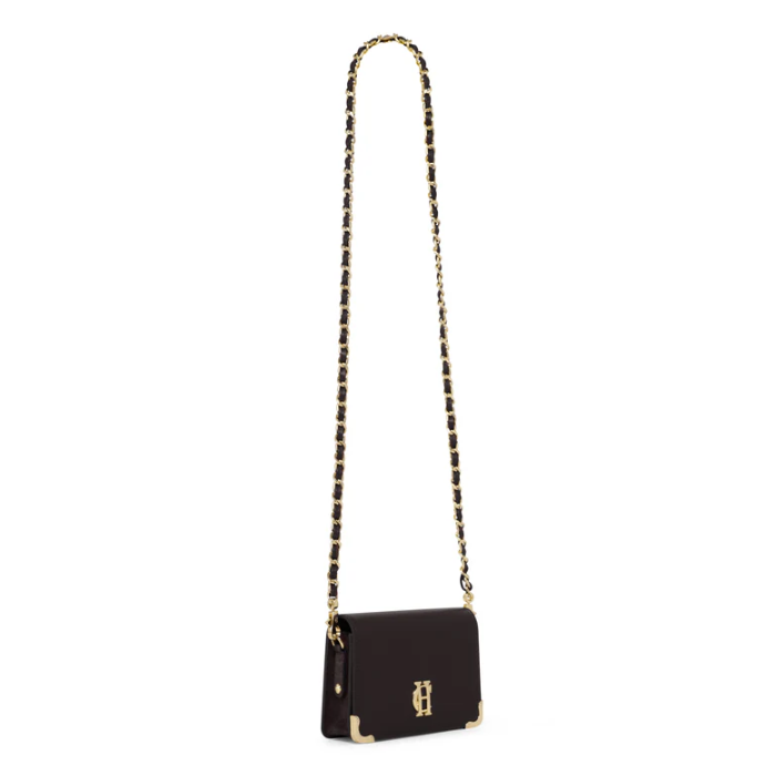 Black handbag with a chain strap on a white background
