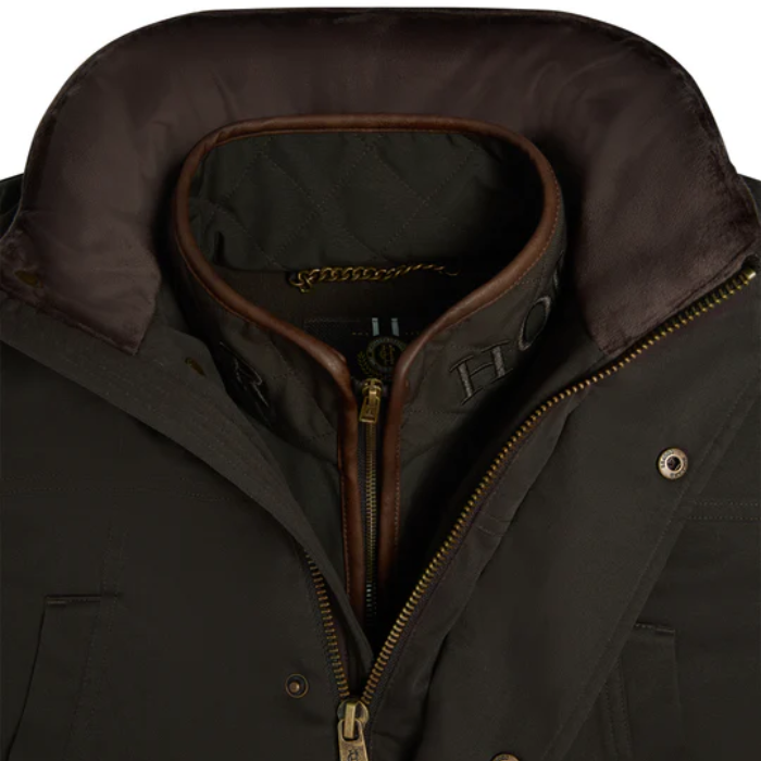 Close-up of a dark brown jacket with a zipper and brand logo on a white background