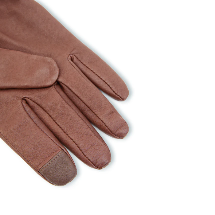 Brown leather gloves on a light grey background