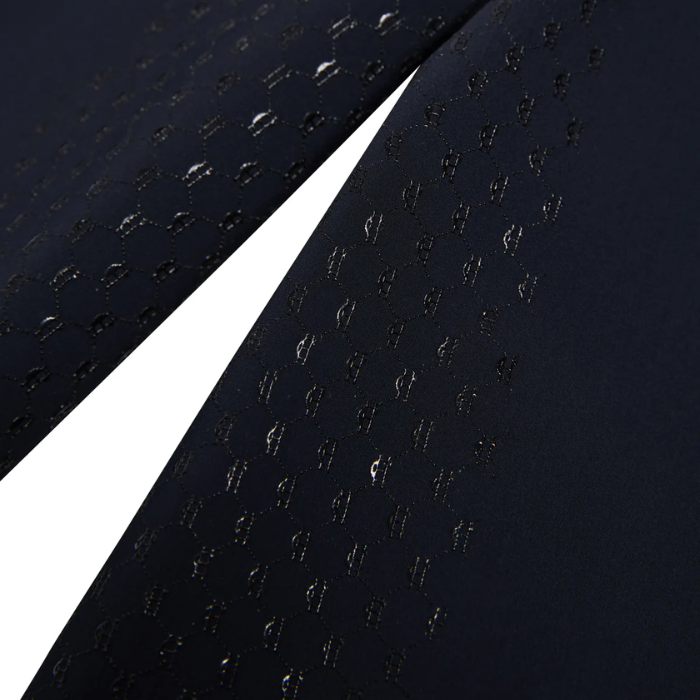 Close-up of a textured black fabric with a pattern