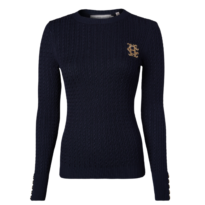 Holland Cooper Princeton Crew Neck Knit Variant Colour Ink Navy.
A dark navy blue long-sleeve knit sweater with a small gold embroidered logo on the left chest,