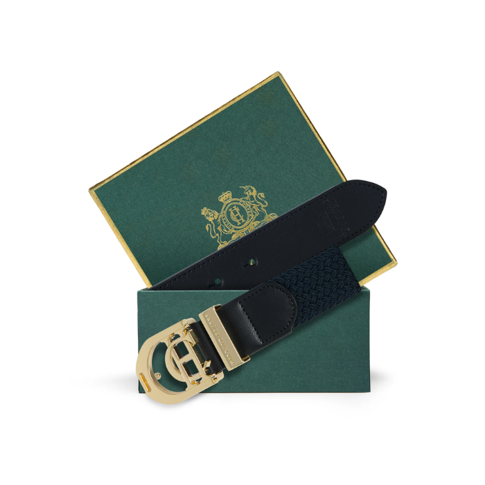 Holland Cooper Stirrup Heritage Belt Variant Colour Ink Navy. A navy belt with CH gold buckle in a green box on white background. 