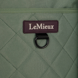 LeMieux logo on a green quilted surface