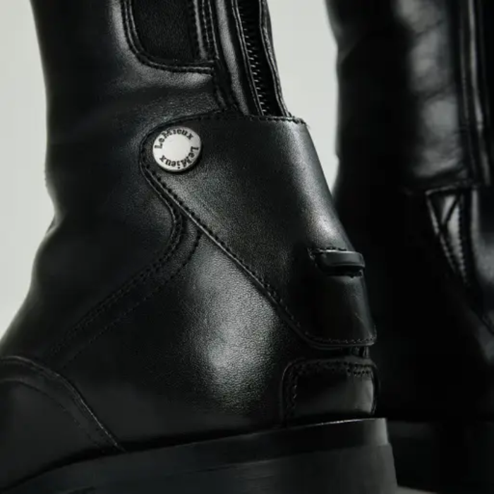 Integrated spur rest on the LeMieux Field Riding Boots in Black