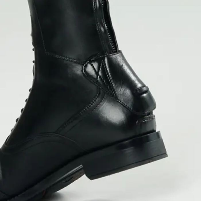 Zip protector on the LeMieux Field Riding Boots in Black
