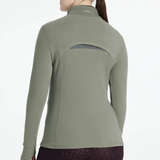 Green long-sleeve riding top with a brand logo on a white background