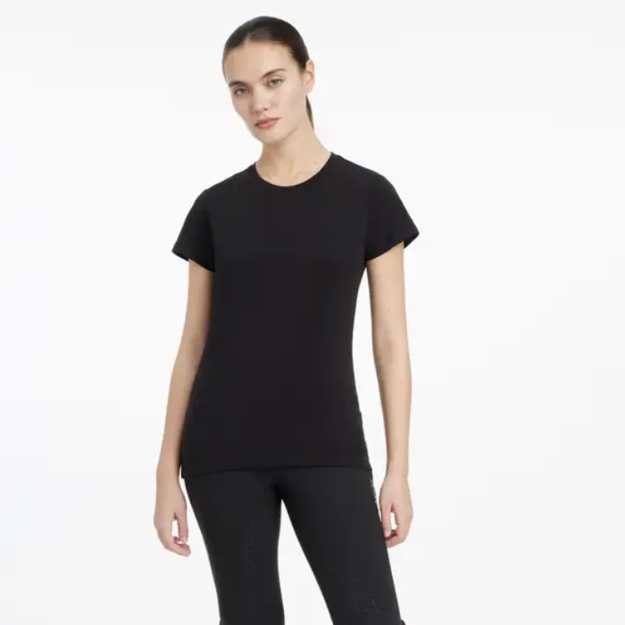 Woman wearing a black t-shirt and black leggings on a white background