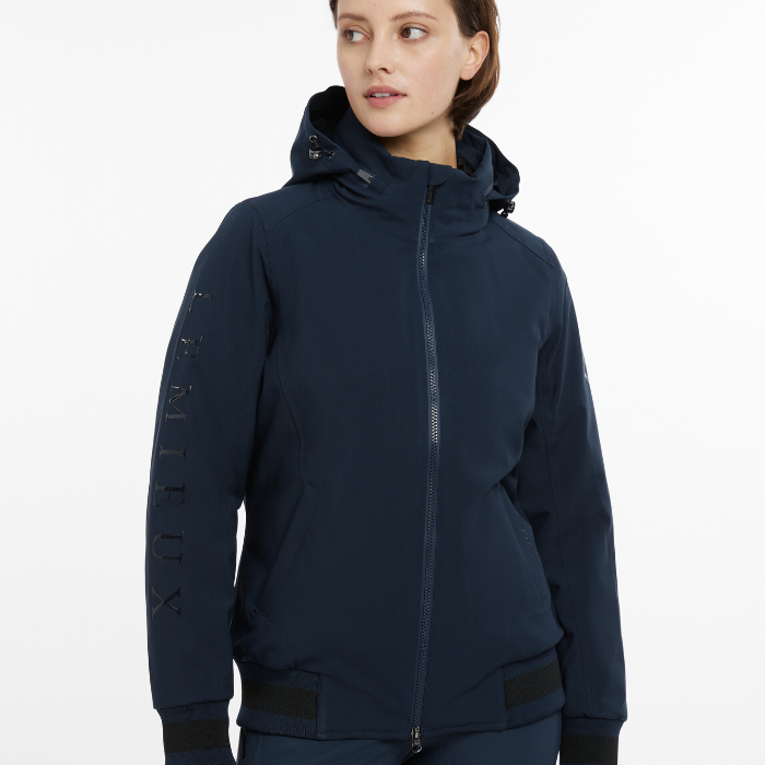 Woman Wears LeMieux Ladies Team Jacket in Navy