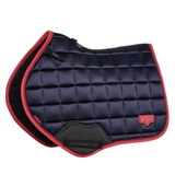 Navy and red quilted saddle pad with visible brand logo on a white background