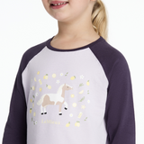 Child wearing a shirt with a horse design on a white background