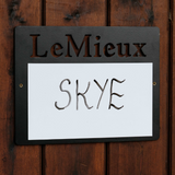 LeMieux stable whiteboard with 'SKYE' on a wooden background
