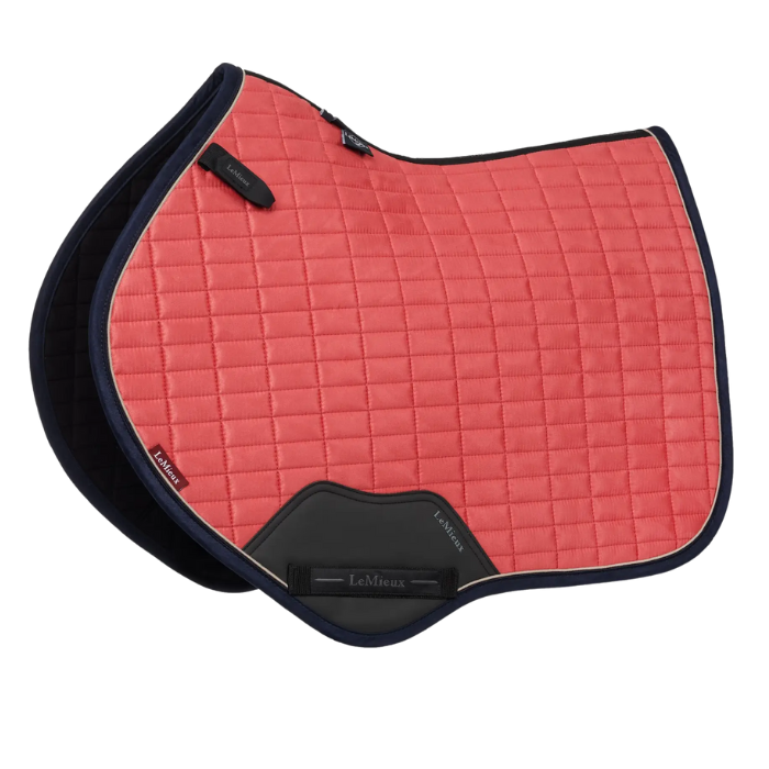 Cranberry red quilted saddle pad with black border on a white background