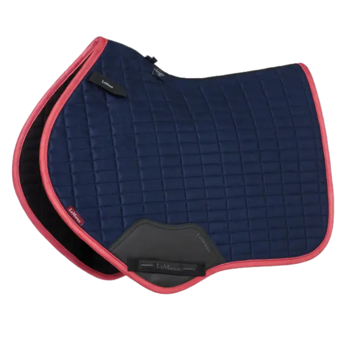 Navy and cranberry saddle pad on a white background