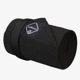 rolled up black tail bandage with LeMieux branding on a grey background