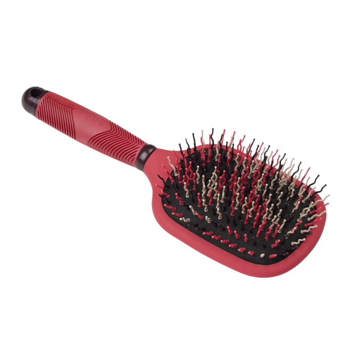 Red hairbrush with black bristles on a white background