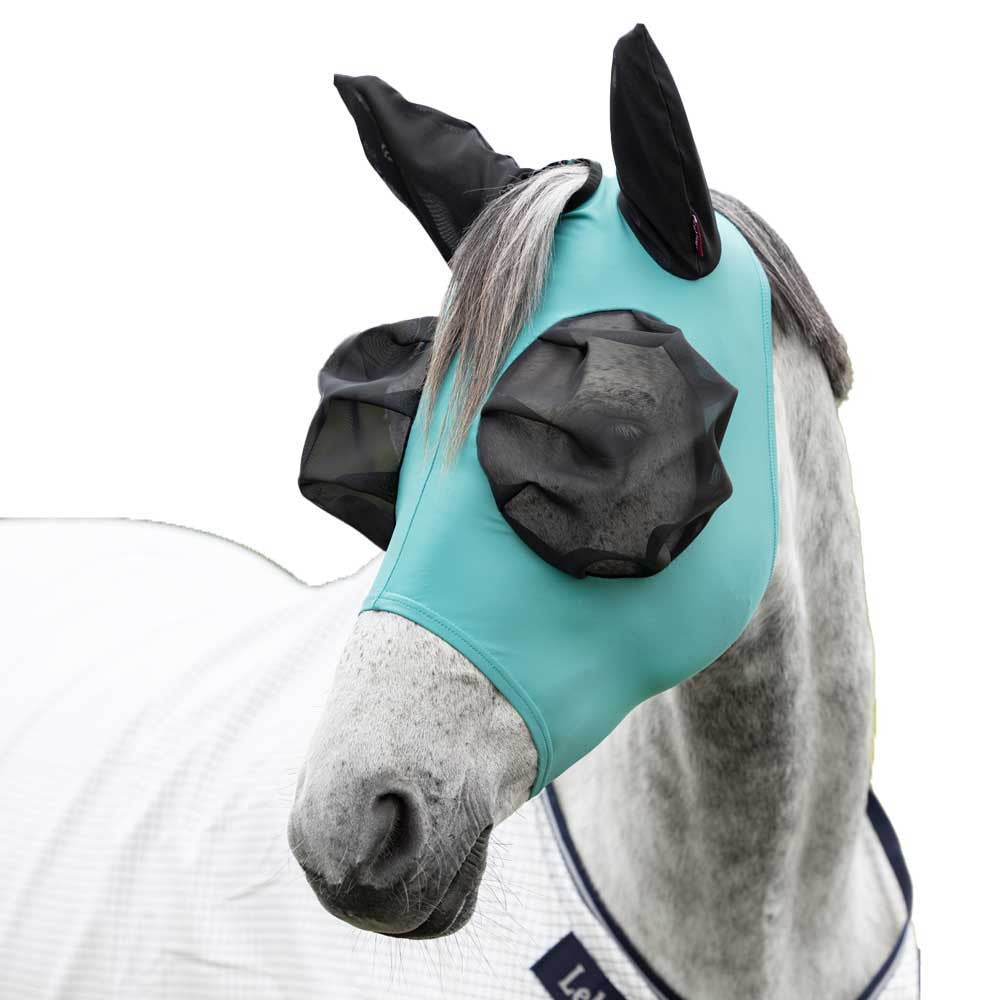 Horse wearing a lagoon fly mask with black ear covers on a white background