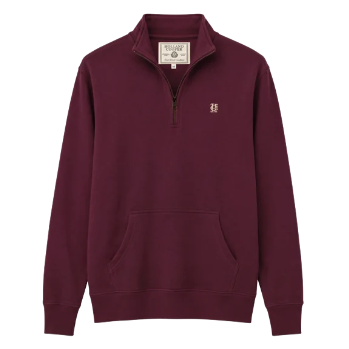 Holland Cooper Classic Quarter Zip Sweat (Men's) Variant Colour Mulberry.
An green quarter-zip sweatshirt with a small embroidered logo on the left chest, displayed on a clean white background.