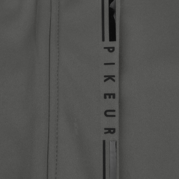Close-up logo detail on the Pikeur Athleisure Softshell Rain Jacket in Moss