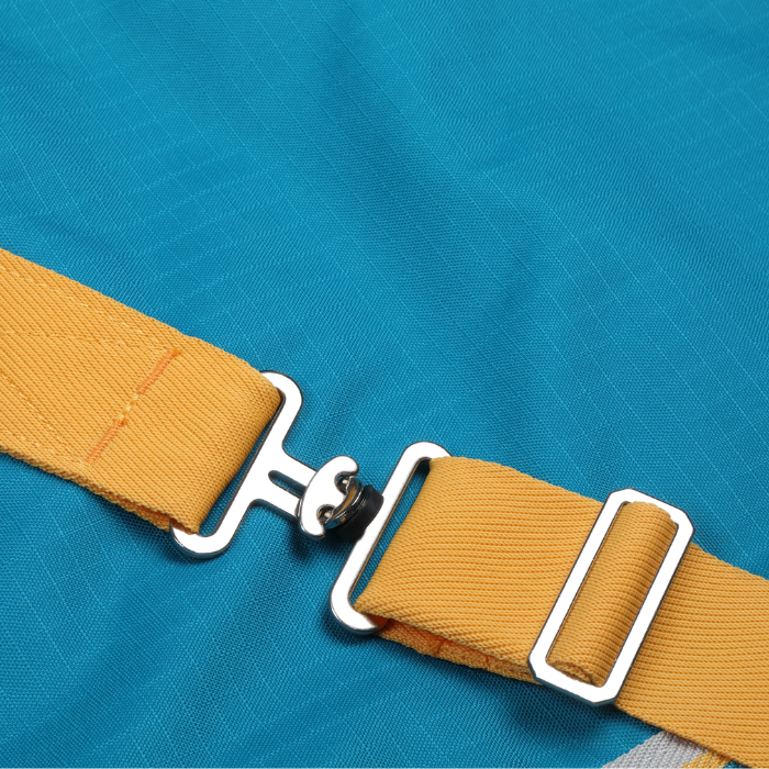 blue horse rug with yellow buckle attachment