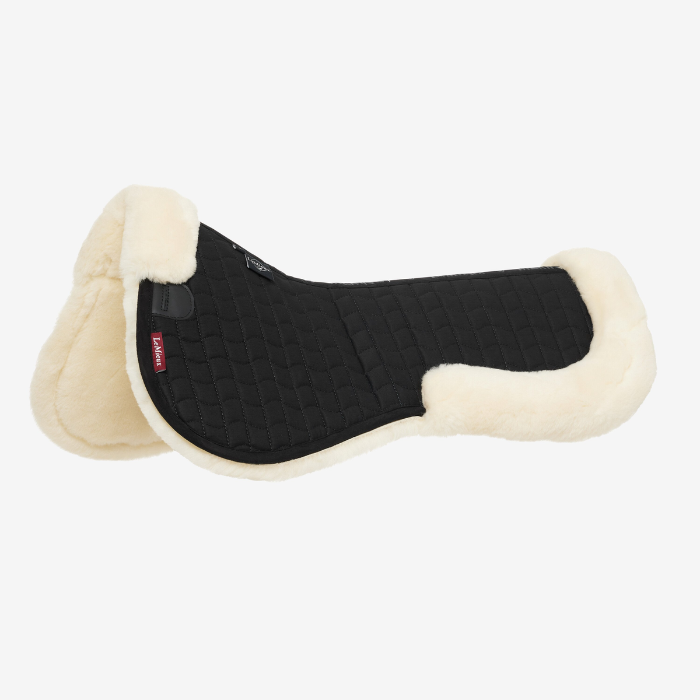 Horse half saddle pad black and natural fur trim on white background
