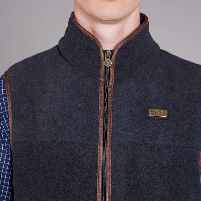 Dark gray gilet with brown zipper and plaid shirt underneath on a grey background