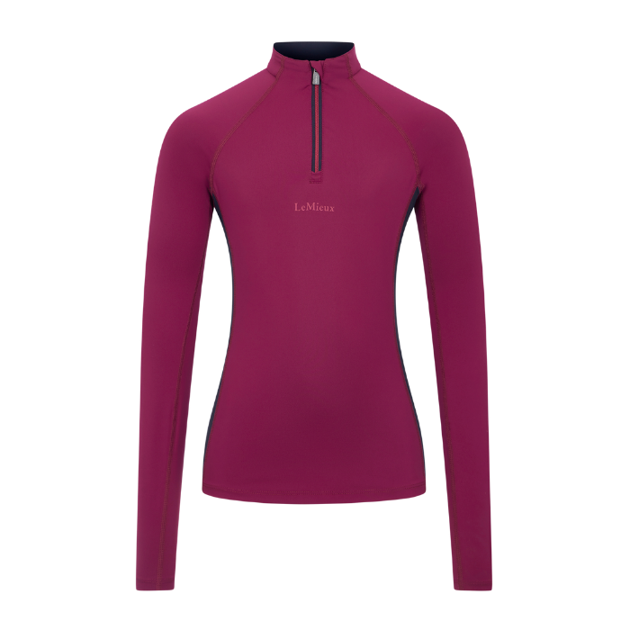 LeMieux AW26 Young Rider Classique Base Layer Variant Colour Blackberry.
A women's long-sleeve quarter-zip athletic top in a deep magenta-purple color, featuring a small 'LeMieux' logo on the left chest and dark piping details, shown on a plain white background.