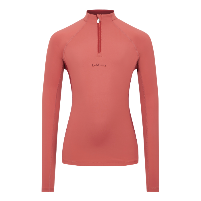 LeMieux AW26 Young Rider Classique Base Layer Variant Colour Spiced Earth.
A women's long-sleeve quarter-zip athletic top in a muted terracotta or salmon pink color, featuring the 'LaMieux' brand name printed in black on the center chest, set against a plain white background.