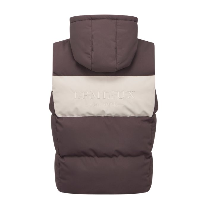 LeMieux AW26 Young Rider Joey Hooded Gilet Varient Cocoa. A puffer vest shown from the back, featuring a large hood with a wide beige horizontal stripe across the middle. The brand name 'LE MIEUX' is printed in light beige on the stripe.
