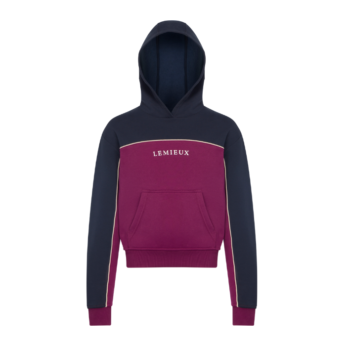 LeMieux AW26 Young Rider Sadie Hoodie Variant Colour Blackberry.
A colorblock hoodie with a navy blue hood and sleeves, a blackberry body panel, and thin cream piping details. The brand name 'LEMIEUX' is printed in white across the chest. on white background.