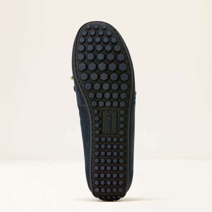 Navy blue shoe sole with Ariat logo on a beige background