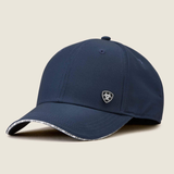 Navy baseball cap with brand logo on a beige background