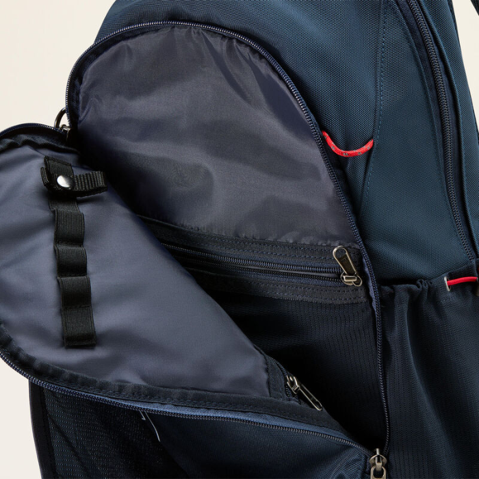 Navy blue backpack with open front compartment on a light beige background