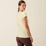 Woman wears a yellow t-shirt and brown leggings on a beige background