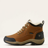 Brown winter boot with black sole on a white background