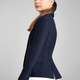 Navy blazer worn by a person on a plain background