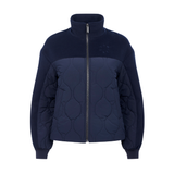 LeMieux AW26 Chloe Bomber Jacket Varient Navy. A navy blue zip-up jacket with a quilted circular pattern on the front and smooth fabric on the upper body and sleeves, shown against a plain white background.