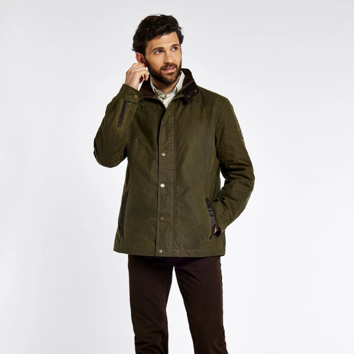 Man wearing a green jacket on a white background