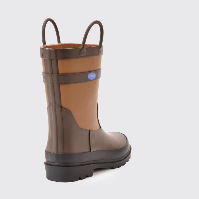 Brown and beige rain boot with a visible brand logo on a light grey background